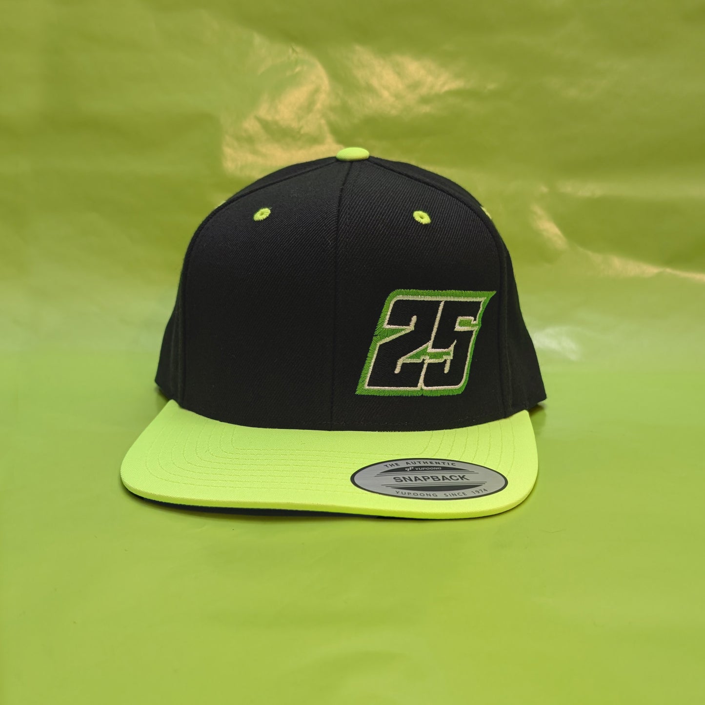 25 Flatbill Snapback with Silver Flag on Back